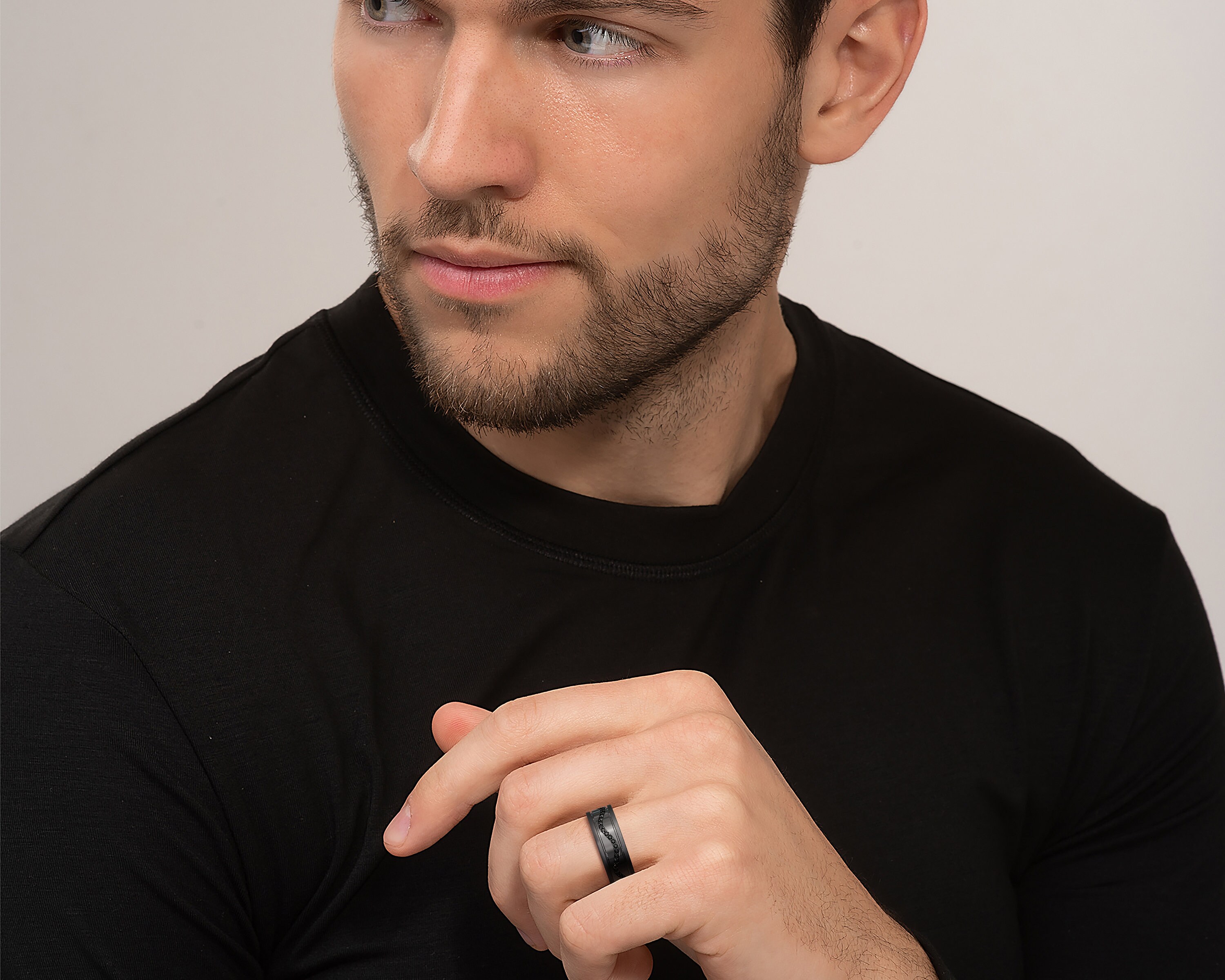 Men wearing black rings online