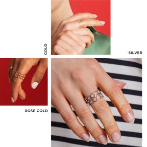 Pode incluir: Tr&ecirc;s an&eacute;is de diferentes cores com um design geom&eacute;trico. Os an&eacute;is s&atilde;o feitos de ouro, ouro rosa e prata. Os an&eacute;is s&atilde;o mostrados em diferentes m&atilde;os.