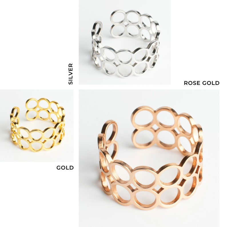 Pode incluir: Tr&ecirc;s an&eacute;is ajust&aacute;veis com um design de padr&atilde;o de c&iacute;rculo. Os an&eacute;is est&atilde;o dispon&iacute;veis em prata, ouro e ouro rosa.
