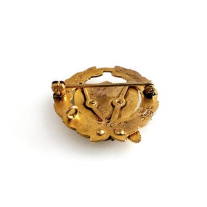 May include: A set of three ceramic mugs with a speckled, matte finish. The mugs are in shades of cream, light gray, and dark gray. Each mug has a simple, minimalist design and a rounded handle.