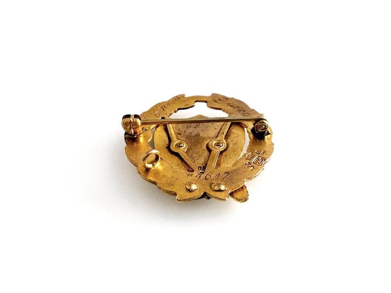 May include: A set of three ceramic mugs with a speckled, matte finish. The mugs are in shades of cream, light gray, and dark gray. Each mug has a simple, minimalist design and a rounded handle.