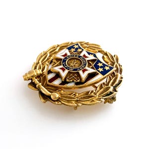 May include: A set of three ceramic mugs with a speckled, matte finish. Each mug features a different color: light blue, cream, and gray. The mugs have a simple, modern design and a comfortable handle.