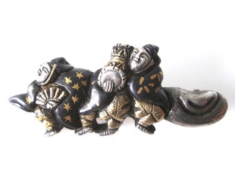 Spilla antica giapponese Shakudo Sword Menuki