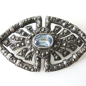 Sterling Silver Marcasite Brooch Set With Blue Glass Stone