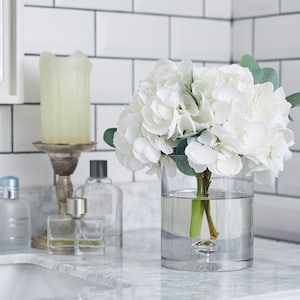 White Hydrangea & Eucalyptus Arrangement in Glass Cylinder Vase