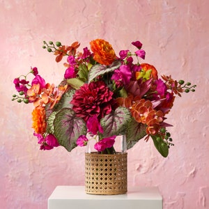 Exotic Elegance - Orange Ranunculus & Orchids, Beauty Dahlia, Begonia Leaf Spring Summer Water Illusion Arrangement in Rattan Wrapped Vase