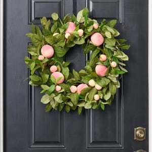 Huertos de melocotoneros: hojas de salal con melocotones peludos Corona para puerta de entrada con vegetación cotidiana para primavera y verano