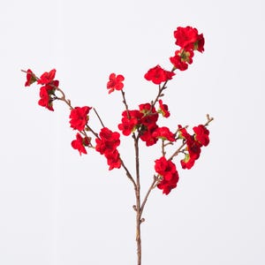 May include: A single artificial flower stem with vibrant red blossoms. The flowers are clustered along brown branches, creating a visually striking display against a plain white background. The stem is ideal for floral arrangements.