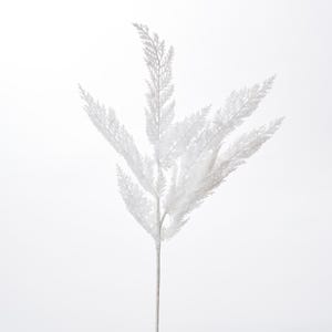 May include: A single white artificial sprig of fluffy, feathery foliage. The stem is white and the leaves are a soft, feathery white.