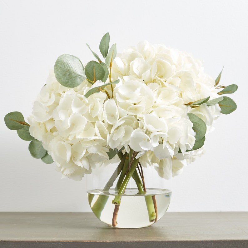 Large White Hydrangea & Eucalyptus Arrangement in Rounded Glass Vase image 5