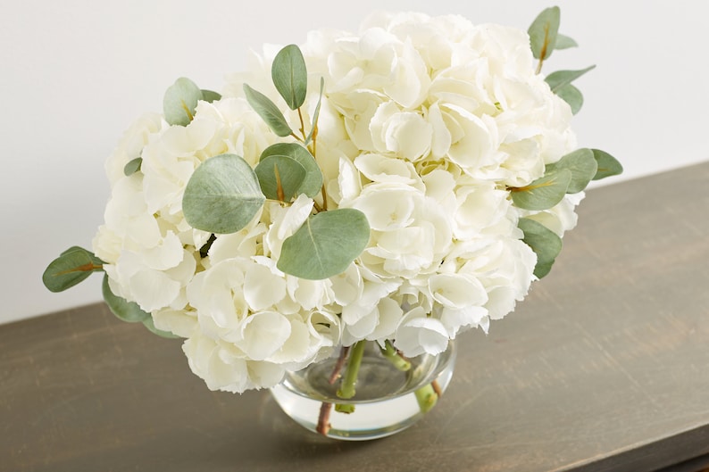 Large White Hydrangea & Eucalyptus Arrangement in Rounded Glass Vase image 6