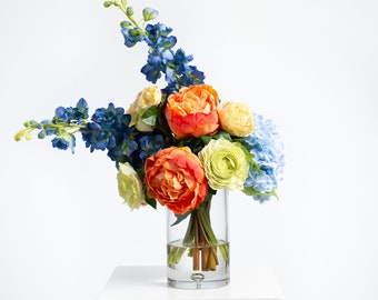 Botanical Bliss with Tangerine Peonies, Sky Blue Hydrangeas, Lemon Lime Ranunculus Water Illusion Arrangement in Small Bubble Vase