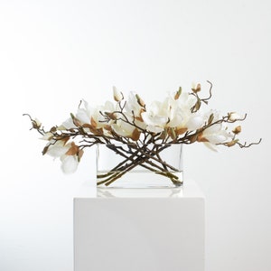 White Magnolia Blossom Branch Centerpiece Water Illusion Arrangement in Oval Pocket Vase