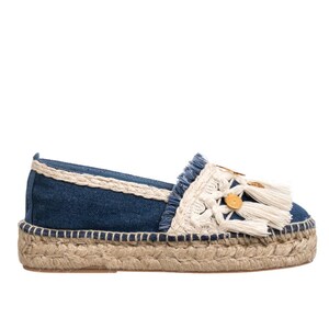 May include: Blue denim espadrille shoes with white crocheted trim and gold button accents. The shoes have a jute sole and a tassel detail.