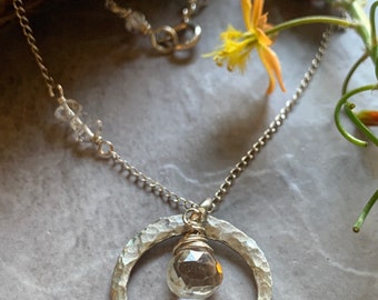 Crescent pendant necklace with quartz crystal