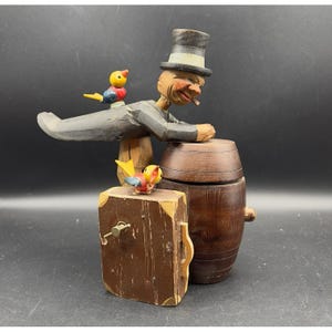 cigarette case man in barrel Sold at Auction: Anri, ANRI DRUNKEN LEANING ON HOLDER Cigarette Box Strange Uncle Santa