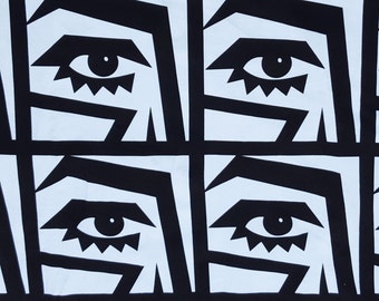 Black Eyes on White Fabric Cotton Spandex Jersey Knit Print by Yard