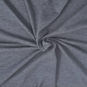 May include: Close-up of a gray fabric with a subtle texture. The fabric is gathered and twisted, creating a swirl effect. The color is a solid, medium gray, with soft shadows and highlights.