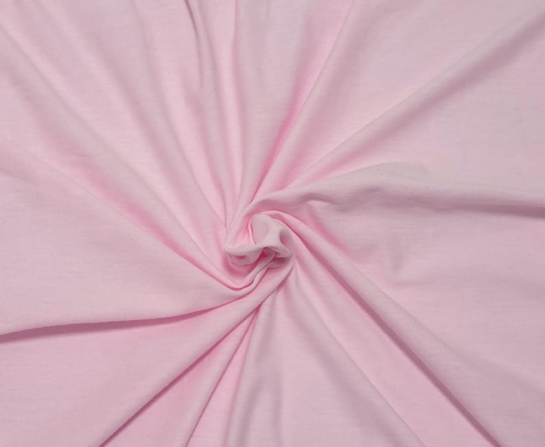 pink lightweight cotton jersey knit fabric by the yard for tee shirts oversized shirts minimalist wardrobe baby clothes and wraps bedding