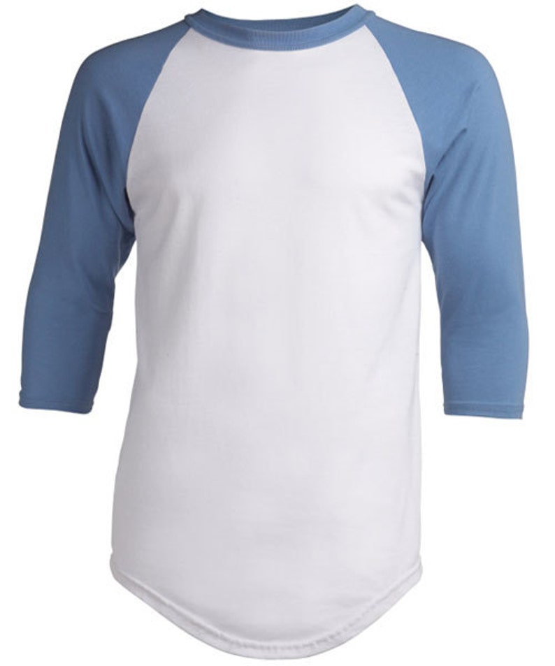 May include: A white baseball tee with blue sleeves. The shirt has a classic baseball design with a rounded neckline and three-quarter sleeves.