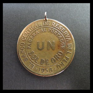 Mystery Factory (1958 Vintage Banco Central Reserva del Peru &quot;Un Sol de Oro&quot; Bronze Coin Pendant; Stainless Steel Bail) Old Peruvian &quot;GOLD&quot;!