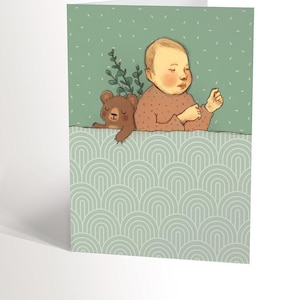 CARD with an illustration of a newborn sleeping peacefully with his teddy bear, welcome baby card, congratulations