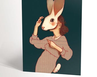 CARTE DE SOUHAIT avec une illustration de femme vintage à tête de lapin beige sur fond vert émeraude énigmatique
