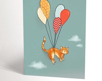CARTE DE FÊTE avec une illustration de chat grumpy qui flotte dans le ciel tiré par des ballons d'anniversaire