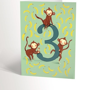 BIRTHDAY CARD for 3 years old boys and girls with a cute illustration of 3 monkeys with bananas