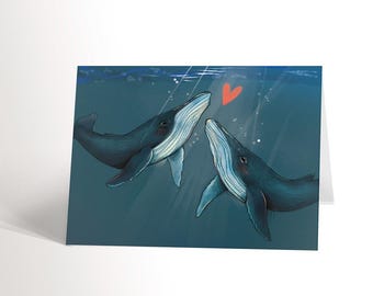 CARTE DE SOUHAIT avec une illustration de deux baleines bleues dans l'océan et un coeur pour les amoureux