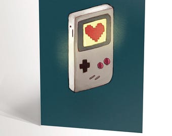 BIRTHDAY CARD with an illustration of a game boy and a pixel heart for a man's birthday