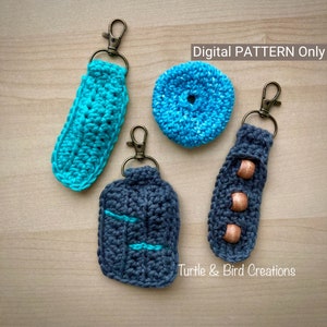 May include: A set of four crocheted keychains, including a teal keychain with a key ring, a grey keychain with a key ring, a teal keychain with a key ring, and a teal keychain with a key ring. The text "Digital PATTERN Only" and "Turtle & Bird Creations" are visible in the image.