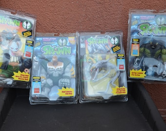 Lot of 4 - 1994 Todd McFarlane's Spawn Special Edition Action figures with Comic Book.