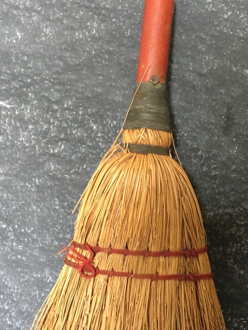 old fashioned straw broom with straw handle old fashioned straw broom with straw handle