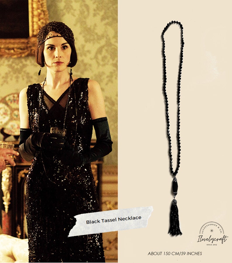 Puede incluir: Collar negro con borla con cuentas negras y una borla negra. El collar mide aproximadamente 150 cm de largo.
