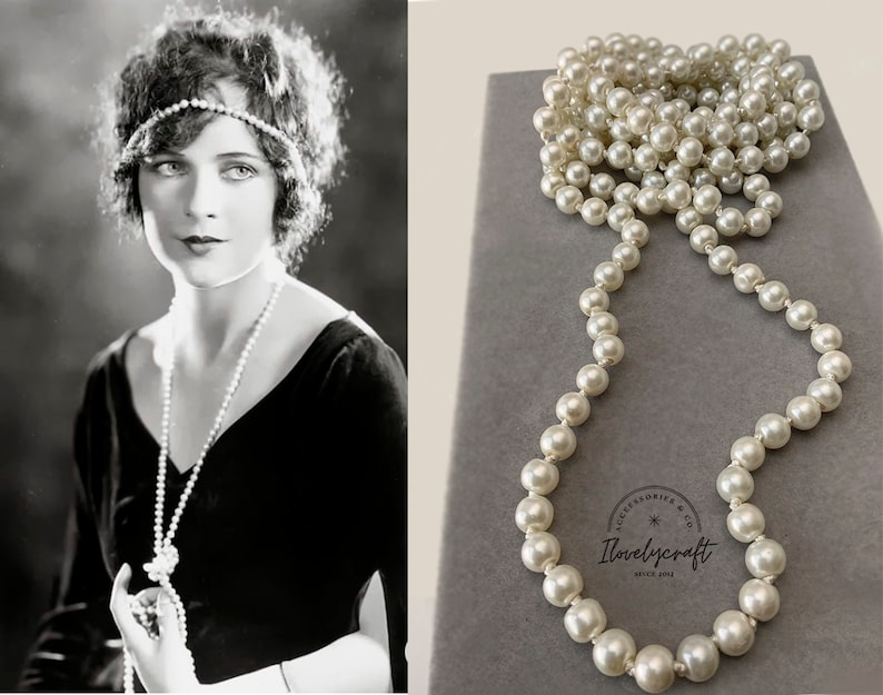 May include: A long strand of white faux pearl beads in a box. The beads are strung on a thin wire and are about 1/2 inch in diameter. The box is gray and has the text "Accessories & Co. Lovelycraft since 2014" printed on it.