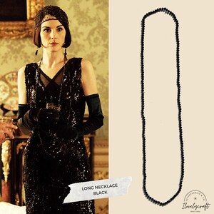 Long Necklace Black made of crystal multifacetated crystal beads.
