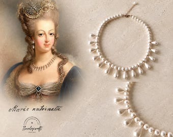 May include: A necklace featuring a strand of round white pearls with dangling teardrop-shaped pearl charms. The jewelry is displayed alongside a historical portrait of Marie Antoinette and the text Ilovelycraft Accessories & Co. Since 2013.