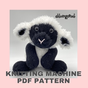 May include: Knitting machine PDF pattern for a black and white knitted sheep toy. The sheep has a fluffy white fleece and black face, legs, and ears. The pattern is available for download.