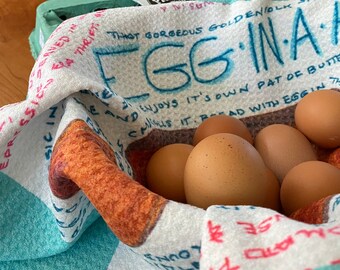 EGG-IN-A-HOLE drawing on sturdy kitchen towel