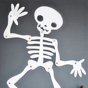 Ubierz Szkielet Skellie - Pozowalna Papierowa Marionetka - Dekoracja ścienna na Halloween