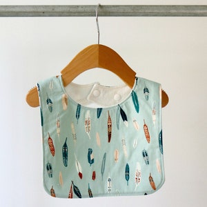 Baby Bib. Blue and Brown Feathers. Boho Baby Bib. Toddler Bib. Baby Feeding Bib. Dribble Bib. Baby Shower Gift. Baby Essentials. Baby Gift.