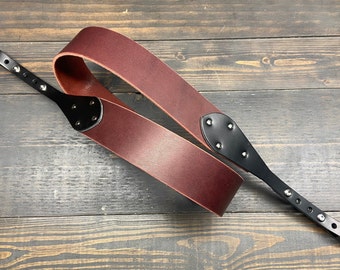 Banjo Strap In Ox Blood Red and Black Leather. Handmade In The USA For Those That Love Country, Americana, Bluegrass and Roots Music.