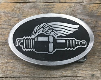 Spark Plug Belt Buckle Made of Etched Metal With Wings is the Perfect Custom Design For Those Who Enjoy Hot Rods, Motorcycles and Racing