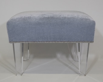 Custom made upholstered ottoman feauting nailheads romo fabric lucite legs