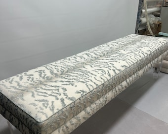 Smooth upholstered semi attached cushion bench lucite legs acrylic legs