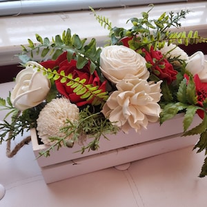 Christmas sola arrangement] Christmas floral arrangement] Christmas centerpiece] Christmas flowers] Christmas wedding flowers
