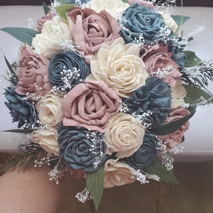 Dusty blue and dusty pink wedding bouquet] dusty blue and pink wrist corsage] pink,blue and cream wedding flowers