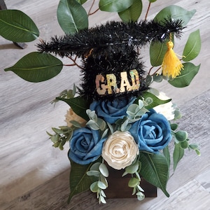 Graduation Gift] grad arrangement] grad flowers] blue flowers for the grad]