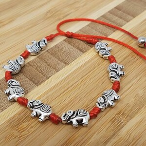 Red elephant bracelet clearance